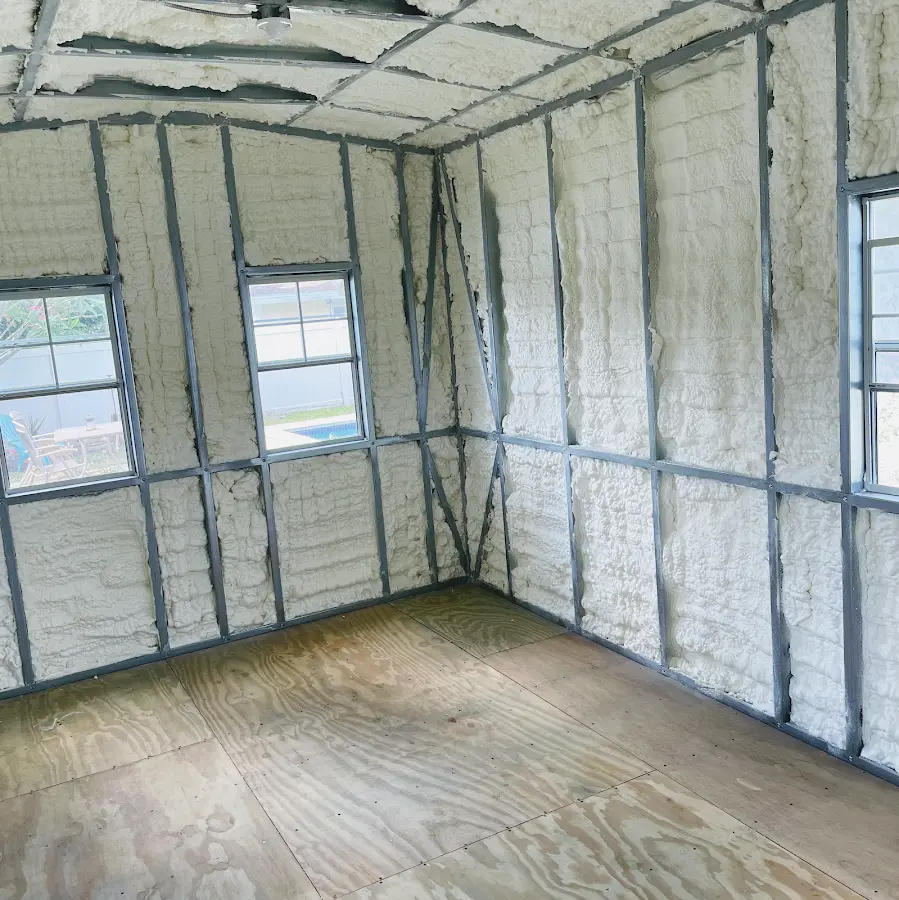 Closed-cell spray foam insulation applied to wall cavities in a residential project in Antwerp